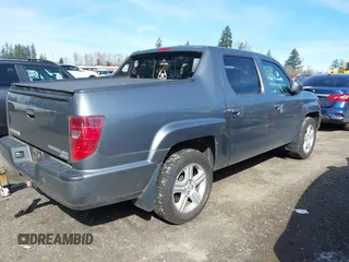 2009 Honda Ridgeline RTL with VIN 5FPYK16599B100707, listed as a IAAI auction lot 41877598 with 130,622 mi miles and . Bid and sale history available at DreamBid. Image 4.
