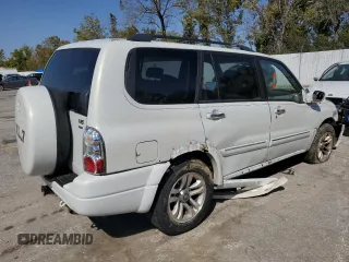 2005 Suzuki XL7 LX z VIN JS3TX92VX54100730, wystawiony jako Copart lot #74913534 z przebiegiem 91 838 mil mil oraz Szkoda całkowita • Salvage title. Historia ofert i sprzedaży dostępna na DreamBid. Obrazek 3.