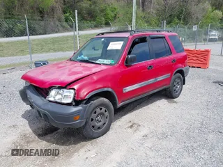 2000 Honda CR-V LX with VIN JHLRD184XYC010847, listed as a IAAI auction lot 42080100 with 256,678 mi miles and . Bid and sale history available at carsss.com. Image 2.