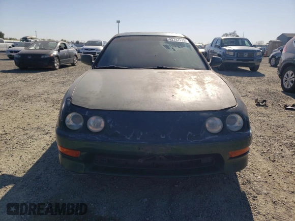 1999 Acura Integra LS with VIN JH4DB7657XS001635, listed as a Copart auction lot 42742925 with 157,447 mi miles and Clean title. Bid and sale history available at DreamBid. Image 5.