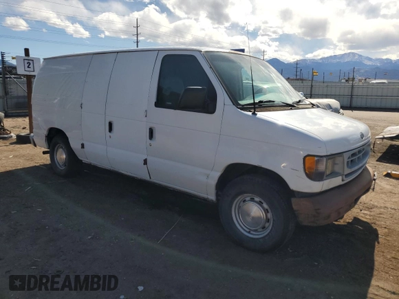 2002 Ford Econoline Cargo with VIN 1FTRE142X2HA55487, listed as a Copart auction lot 52957645 with 270,731 mi miles and Clean Title. Bid and sale history available at carsss.com. Image 4.