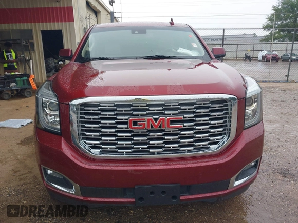 2020 GMC Yukon Denali with VIN 1GKS2CKJ5LR129592, listed as a IAAI auction lot 39806304 with 71,125 mi miles. Bid and sale history available at carsss.com. Image 6.