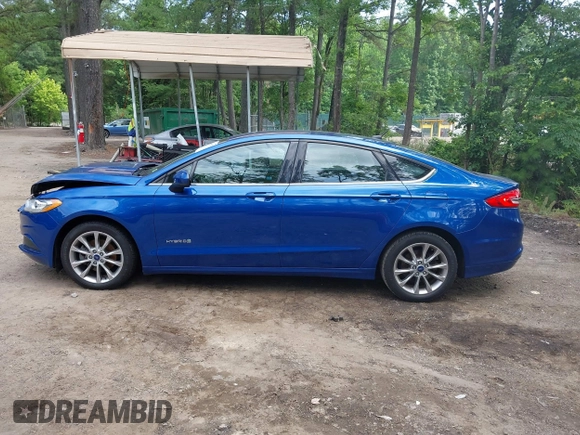 2017 Ford Fusion Hybrid SE with VIN 3FA6P0LU1HR162662, listed as a IAAI auction lot 42465793 with 116,414 mi miles and . Bid and sale history available at DreamBid. Image 14.