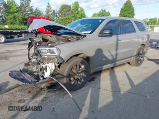 2021 Dodge Durango GT Plus z VIN 1C4RDHDG4MC750121, wystawiony jako IAAI lot #42160722 z przebiegiem 87 321 mil mil oraz . Historia ofert i sprzedaży dostępna na DreamBid. Obrazek 2.