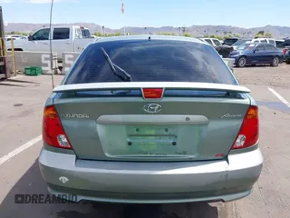 2003 Hyundai Accent GL with VIN KMHCG35C53U277734, listed as a IAAI auction lot 42085996 with 108,369 mi miles. Bid and sale history available at carsss.com. Image 16.