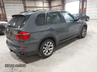2012 BMW X5 35i z VIN 5UXZV4C59CL985715, wystawiony jako IAAI lot #42307586 z przebiegiem 105 147 mil mil oraz . Historia ofert i sprzedaży dostępna na DreamBid. Obrazek 4.