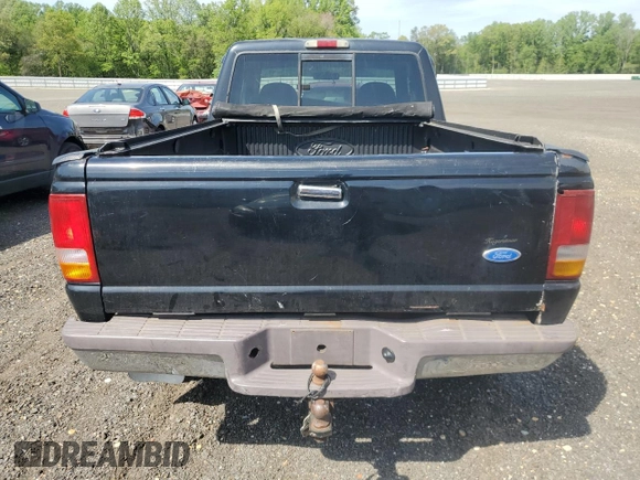 1997 Ford Ranger XLT with VIN 1FTDR15X9VTA24287, listed as a Copart auction lot 54923325 with 148,921 mi miles and Salvage Title. Bid and sale history available at DreamBid. Image 6.