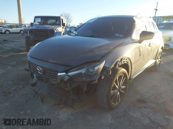 2016 Mazda CX-3 Grand Touring with VIN JM1DKBD74G0115936, listed as a IAAI auction lot 41296104 with 191,408 mi miles. Bid and sale history available at carsss.com. Image 6.