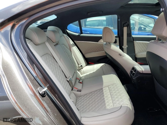 2023 Genesis G70 3.3T with VIN KMTG54TEXPU117927, listed as a Copart auction lot 49095243 with 0 mi miles. Bid and sale history available at carsss.com. Image 10.