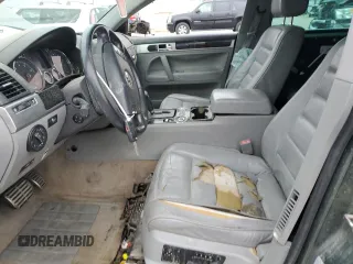 2004 Volkswagen Touareg with VIN WVGCM67L04D027410, listed as a Copart auction lot 79044964 with 100,509 mi miles and Salvage title. Bid and sale history available at DreamBid. Image 7.