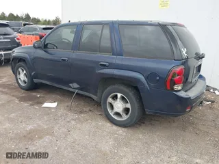 2009 Chevrolet TrailBlazer LT w/1LT with VIN 1GNDS33S992128577, listed as a IAAI auction lot 41912581 with 194,579 mi miles. Bid and sale history available at carsss.com. Image 3.