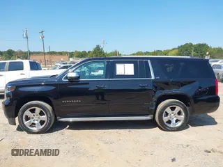 2015 Chevrolet Suburban LTZ with VIN 1GNSKKKC7FR205638, listed as a IAAI auction lot 40284367 with 103,530 mi miles and . Bid and sale history available at DreamBid. Image 14.