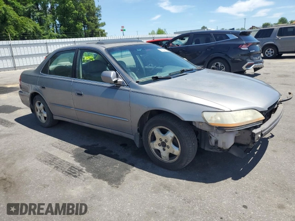 2000 Honda Accord EX с VIN 1HGCG1651YA085715, выставлен на аукционе Copart как лот 56040745 с пробегом 316 369 миль миль и Списание • Salvage title. История ставок и продаж доступна на DreamBid. Изображение 4.
