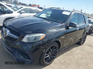 2016 Mercedes-Benz GLE 63 S AMG with VIN 4JGDA7FBXGA665133, listed as a IAAI auction lot 41634945 with 105,800 mi miles and . Bid and sale history available at DreamBid. Image 2.