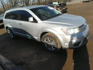 2014 Dodge Journey Limited with VIN 3C4PDCDG9ET157841, listed as a IAAI auction lot 41609646 with 130,329 mi miles and . Bid and sale history available at DreamBid. Image 1.