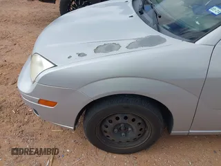 2007 Ford Focus S with VIN 1FAHP34N37W289507, listed as a IAAI auction lot 42632851 with 159,806 mi miles and . Bid and sale history available at DreamBid. Image 6.