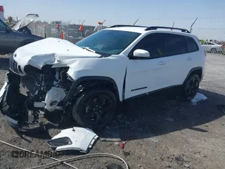 2021 Jeep Cherokee Altitude with VIN 1C4PJLLB1MD180422, listed as a IAAI auction lot 41830952 with 73,839 mi miles. Bid and sale history available at carsss.com. Image 2.