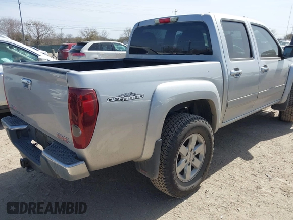 2010 GMC Canyon SLE1 z VIN 1GTJSCDEXA8130361, wystawiony jako IAAI lot #41734671 z przebiegiem 52 621 mil mil oraz . Historia ofert i sprzedaży dostępna na DreamBid. Obrazek 4.
