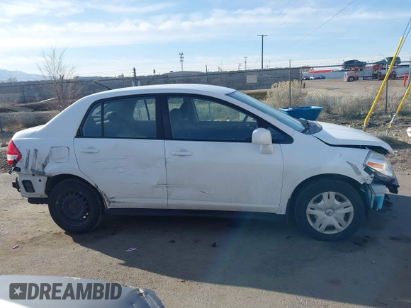 2010 Nissan Versa 1.8 S with VIN 3N1BC1AP8AL465537, listed as a IAAI auction lot 41762115 with 163,533 mi miles and . Bid and sale history available at carsss.com. Image 13.
