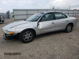2000 Oldsmobile Intrigue GLS z VIN 1G3WX52H0YF233648, wystawiony jako Copart lot #72619824 z przebiegiem Nie podano mil oraz Nie do naprawy. Historia ofert i sprzedaży dostępna na DreamBid. Obrazek 1.