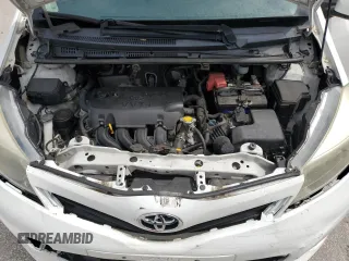 2014 Toyota Yaris L with VIN VNKJTUD37EA008192, listed as a Copart auction lot 70955594 with 129,486 mi miles and Salvage Title. Bid and sale history available at carsss.com. Image 13.