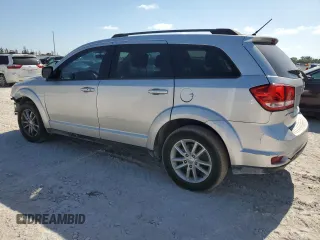 2014 Dodge Journey SXT with VIN 3C4PDCBG2ET127048, listed as a Copart auction lot 54823955 with 170,526 mi miles and Clean Title. Bid and sale history available at carsss.com. Image 2.