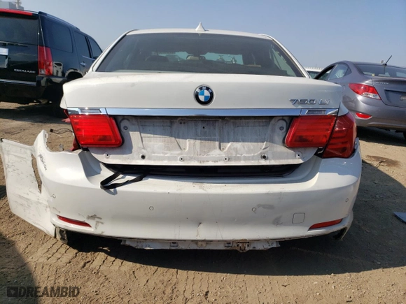 2012 BMW 7 Series 750Li with VIN WBAKB8C53CC963404, listed as a Copart auction lot 67312324 with 0 mi miles and Salvage Title. Bid and sale history available at carsss.com. Image 6.