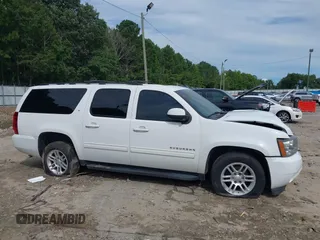 2014 Chevrolet Suburban LT with VIN 1GNSCJE08ER185472, listed as a IAAI auction lot 39849223 with 198,853 mi miles. Bid and sale history available at carsss.com. Image 13.