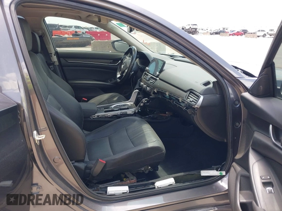 2019 Honda Accord Touring with VIN 1HGCV2F93KA013002, listed as a IAAI auction lot 42519920 with 76,841 mi miles and . Bid and sale history available at DreamBid. Image 5.