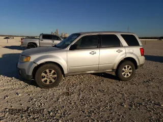 2011 Mazda Tribute Touring with VIN 4F2CY0C73BKM05324, listed as a Copart auction lot 48616125 with 97,376 mi miles and Salvage Title. Bid and sale history available at carsss.com. Image 1.