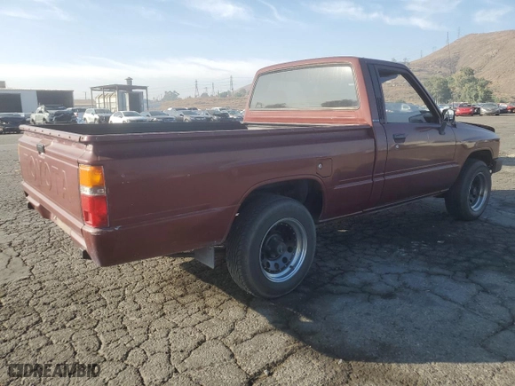 1985 Toyota Pickup with VIN JT4RN50R2F0098235, listed as a Copart auction lot 72764954 with NaN miles and Salvage Title. Bid and sale history available at carsss.com. Image 3.