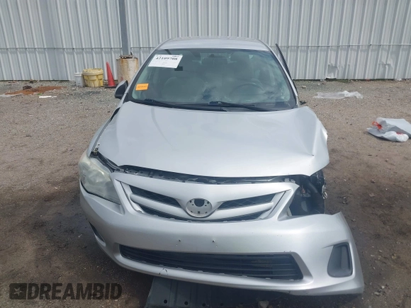 2013 Toyota Corolla L with VIN 5YFBU4EE8DP161765, listed as a IAAI auction lot 42109708 with 105,931 mi miles and . Bid and sale history available at DreamBid. Image 13.