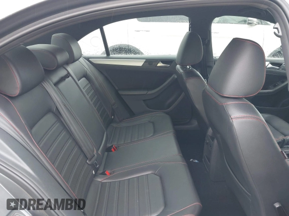 2014 Volkswagen Jetta GLI z VIN 3VW4T7AJ2EM208598, wystawiony jako IAAI lot #42381855 z przebiegiem 82 761 mil mil oraz . Historia ofert i sprzedaży dostępna na DreamBid. Obrazek 8.