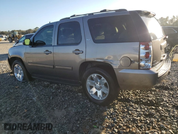 2011 GMC Yukon SLT with VIN 1GKS1CE05BR270876, listed as a Copart auction lot 75906934 with 215,964 mi miles and Salvage Title. Bid and sale history available at carsss.com. Image 2.