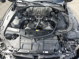 2014 BMW M6 z VIN WBS6C9C56ED467395, wystawiony jako Copart lot #45427405 z przebiegiem 91 506 mil mil oraz Szkoda całkowita • Salvage title. Historia ofert i sprzedaży dostępna na DreamBid. Obrazek 11.