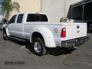 2012 Ford F-450 XL with VIN 1FT8W4DTXCEB96713, listed as a Copart auction lot 71784504 with 220,911 mi miles and Salvage Title. Bid and sale history available at carsss.com. Image 4.