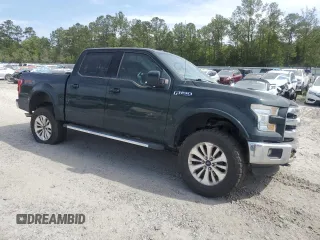 2015 Ford F-150 XLT with VIN 1FTEW1EFXFFC86307, listed as a Copart auction lot 52156875 with 112,395 mi miles and Salvage Title. Bid and sale history available at carsss.com. Image 4.