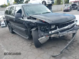 2005 Chevrolet Tahoe Z71 z VIN 1GNEC13TX5R145310, wystawiony jako IAAI lot #42056793 z przebiegiem 159 002 mil mil oraz . Historia ofert i sprzedaży dostępna na DreamBid. Obrazek 1.
