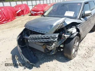 2013 Land Rover Range Rover Evoque Pure Plus z VIN SALVP2BG9DH851415, wystawiony jako IAAI lot #41893972 z przebiegiem 91 861 mil mil oraz . Historia ofert i sprzedaży dostępna na DreamBid. Obrazek 6.