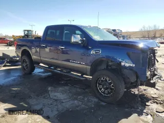 2017 Nissan Titan XD PRO-4X with VIN 1N6BA1F41HN575936, listed as a Copart auction lot 49919955 with 115,416 mi miles and Salvage Title. Bid and sale history available at carsss.com. Image 4.