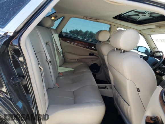 2002 Jaguar XJ with VIN SAJDA15BX2MF47193, listed as a Copart auction lot 49065275 with 69,544 mi miles and Salvage title. Bid and sale history available at DreamBid. Image 10.