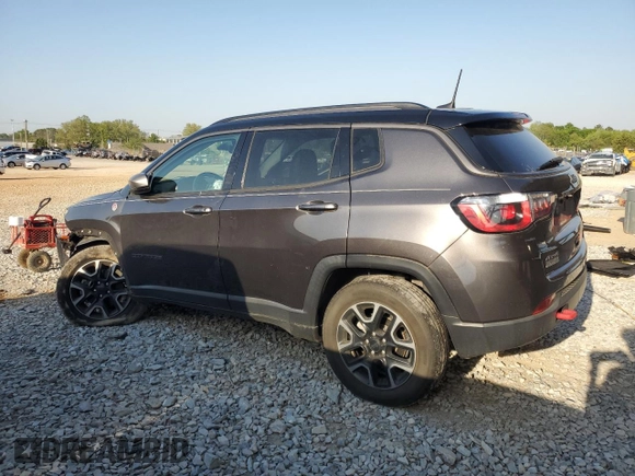 2019 Jeep Compass Trailhawk with VIN 3C4NJDDB5KT722026, listed as a Copart auction lot 52824885 with 105,727 mi miles and Salvage title. Bid and sale history available at DreamBid. Image 2.