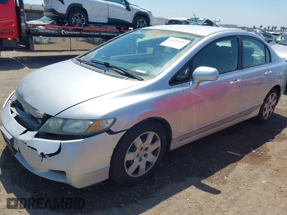 2010 Honda Civic LX with VIN 2HGFA1F50AH316349, listed as a IAAI auction lot 42229156 with 167,960 mi miles and . Bid and sale history available at DreamBid. Image 2.