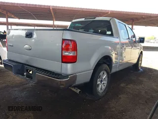 2006 Ford F-150 XLT with VIN 1FTRW12W86KB27394, listed as a IAAI auction lot 42015606 with 231,897 mi miles. Bid and sale history available at carsss.com. Image 4.