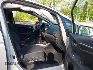 2015 Honda Fit LX with VIN 3HGGK5H50FM772396, listed as a IAAI auction lot 42112723 with 125,419 mi miles and . Bid and sale history available at carsss.com. Image 5.