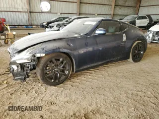 2015 Nissan 370Z with VIN JN1AZ4EH7FM441550, listed as a Copart auction lot 77825314 with 109,697 mi miles and Salvage Title. Bid and sale history available at carsss.com. Image 1.