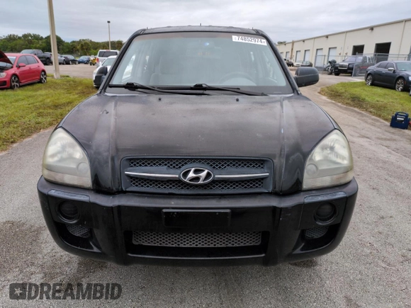 2005 Hyundai Tucson GL with VIN KM8JM12BX5U071182, listed as a Copart auction lot 74852974 with 74,235 mi miles and Salvage Title. Bid and sale history available at carsss.com. Image 5.