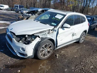 2017 BMW X1 xDrive28i with VIN WBXHT3Z36H4A52364, listed as a IAAI auction lot 41397667 with 61,960 mi miles. Bid and sale history available at carsss.com. Image 18.