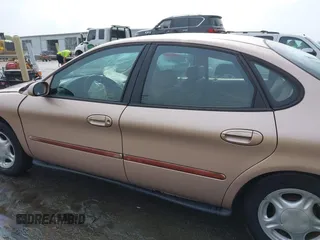 1997 Ford Taurus GL z VIN 1FALP52U2VA273762, wystawiony jako IAAI lot #41956536 z przebiegiem 177 340 mil mil oraz . Historia ofert i sprzedaży dostępna na DreamBid. Obrazek 14.