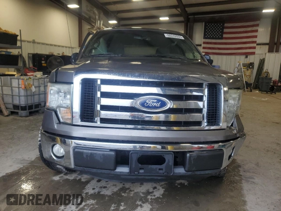 2011 Ford F-150 XL with VIN 1FTFW1CF3BFA90954, listed as a Copart auction lot 60242655 with 195,584 mi miles and Salvage title. Bid and sale history available at DreamBid. Image 5.